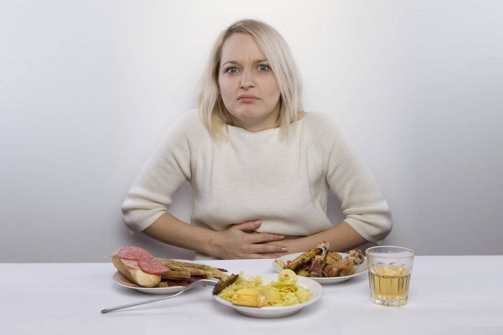 Почему болит желудок во время беременности: причины и лечение