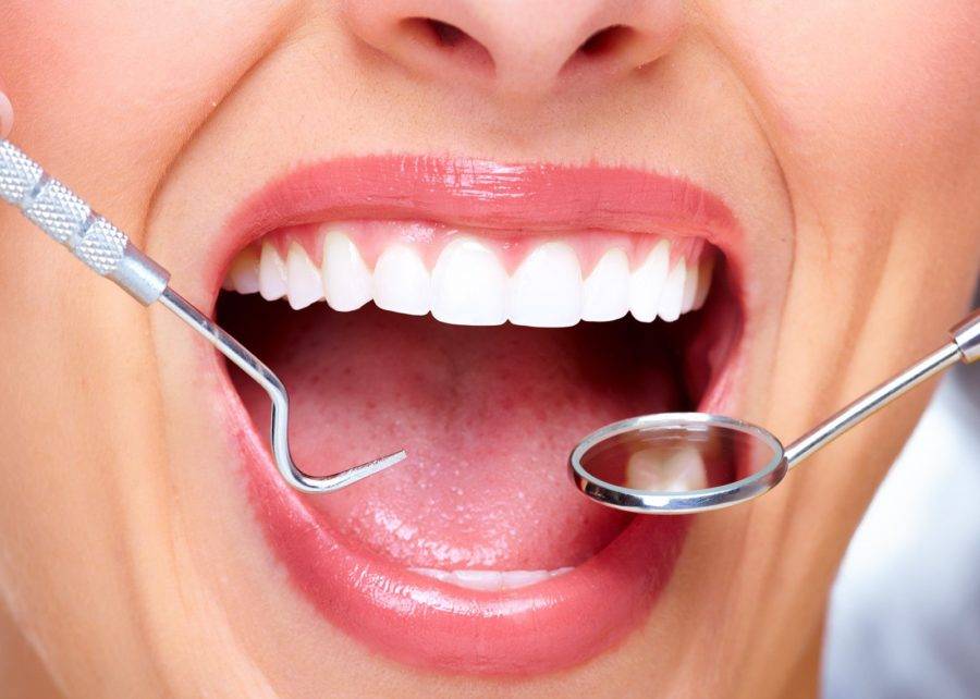 Запах изо рта после удаления зуба: что делать если неприятно пахнет